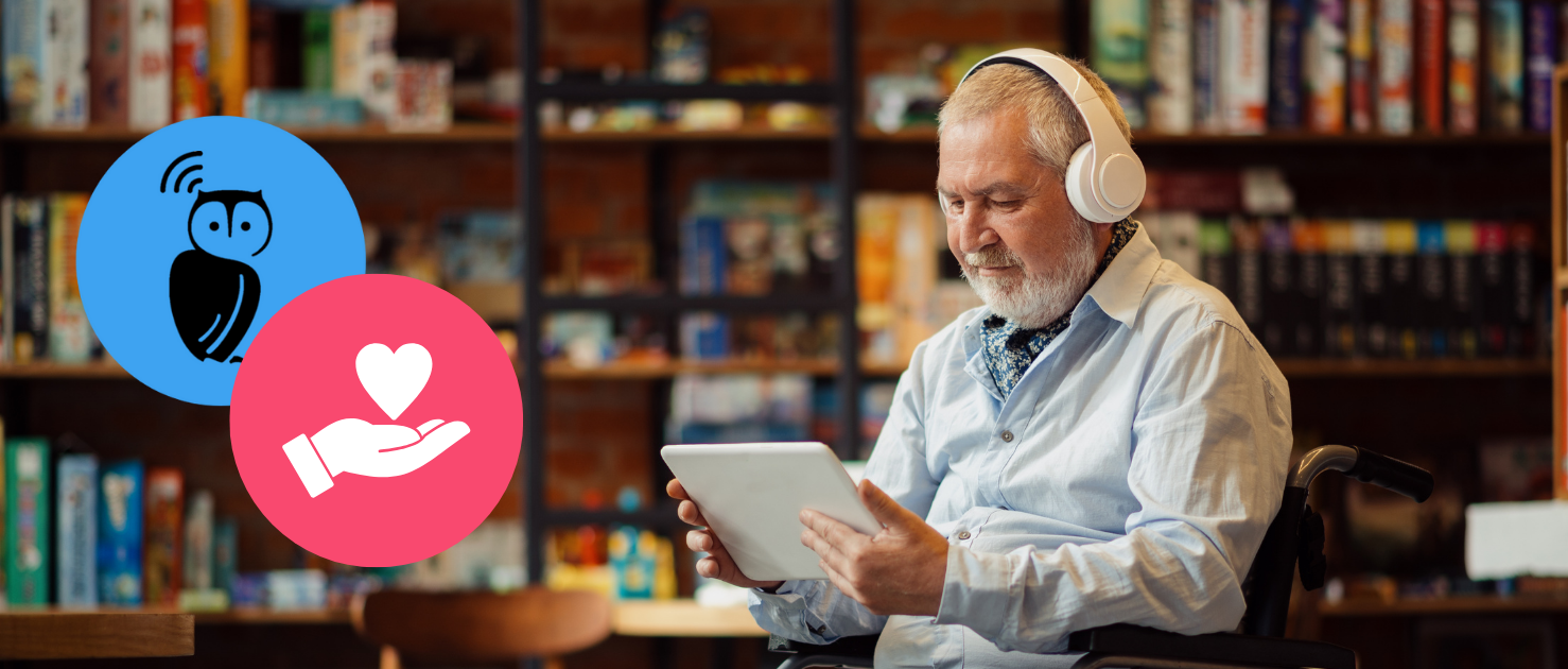 Older man sat looking at an tablet computer with book shelves in the background. To the right there is a blue circle with the Listening Books owl, and a pink circle with a hand. Older man sat looking at an tablet computer with book shelves in the background. To the right there is a blue circle with the Listening Books owl, and a pink circle with a hand.
